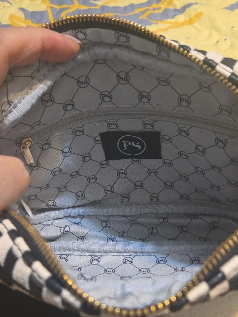 Checkered Black and White Crossbody Bag with Tassel Accent